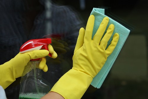 Office cleaners working in a TW10 workplace reception area